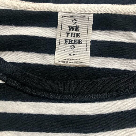 Free People black striped pull over with floral hem. - Picture 2 of 4